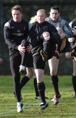 080206  Wales rugby training,Cardiff - L-r Matthew Watkins, Martyn Williams and Stephen Jones get into their stride   