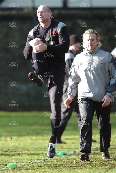 080206  Wales rugby training,Cardiff - Gareth Thomas gets into his stride as Alix Popham follows   