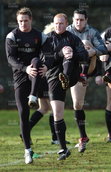 080206  Wales rugby training,Cardiff - L-r Matthew Watkins, Martyn Williams and Stephen Jones get into their stride   