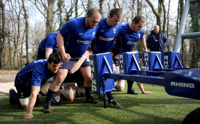 08.03.11 - Wales Rugby Training - (L-R) Sam Warburton, Craig Mitchell, Matthew Rees and Paul James pack down on the scrum machine during training. 