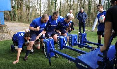 08.03.11 - Wales Rugby Training - (L-R) Sam Warburton, Craig Mitchell, Matthew Rees and Paul James pack down on the scrum machine during training. 