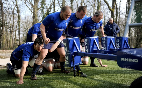 08.03.11 - Wales Rugby Training - (L-R) Sam Warburton, Craig Mitchell, Matthew Rees and Paul James pack down on the scrum machine during training. 