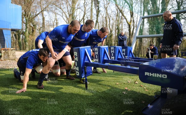 08.03.11 - Wales Rugby Training - (L-R) Sam Warburton, Craig Mitchell, Matthew Rees and Paul James pack down on the scrum machine during training. 