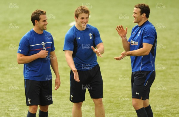 08.03.11 - Wales Rugby Training - Lee Byrne, Jonathan Davies and Jamie Roberts during training. 