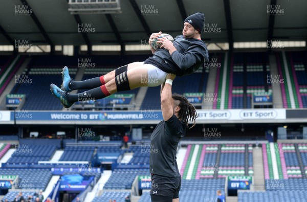 080319 - Wales Rugby Training - Justin Tipuric is lifted by Josh Navidi during training