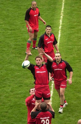 080601 - Wales Rugby Training - Wales captain Andy Moore takes lineout ball watched by (top to bottom) Gavin Thomas, Andy Lloyd, Chris Anthony, Geraint Lewis,and Andrew Lewis at the Hanazono Stadium in Osaka