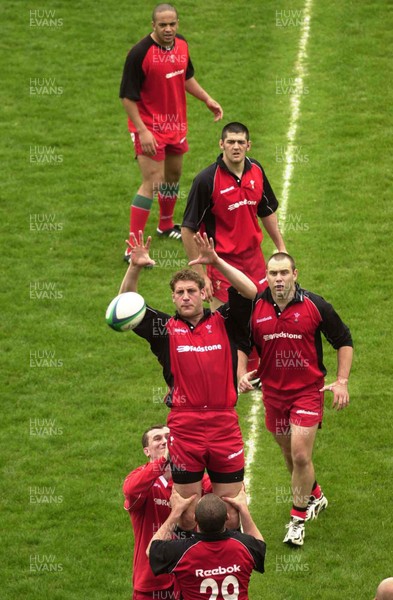 080601 - Wales Rugby Training - Wales captain Andy Moore takes lineout ball watched by (top to bottom) Gavin Thomas, Andy Lloyd, Chris Anthony, Geraint Lewis,and Andrew Lewis at the Hanazono Stadium in Osaka