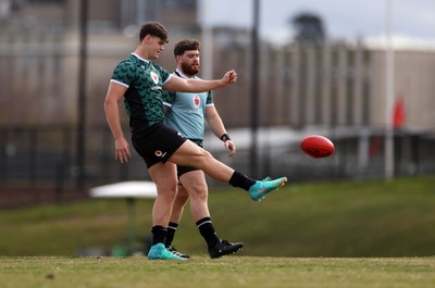 080724 - Wales Rugby enjoy a quick game of Aussie Rules Football in Training in the week ahead of their second test against Australia in Melbourne - Eddie James during training