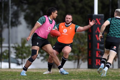 080724 - Wales Rugby enjoy a quick game of Aussie Rules Football in Training in the week ahead of their second test against Australia in Melbourne - Mackenzie Martin during training