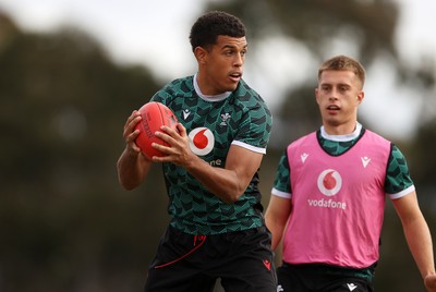 080724 - Wales Rugby enjoy a quick game of Aussie Rules Football in Training in the week ahead of their second test against Australia in Melbourne - Rio Dyer during training