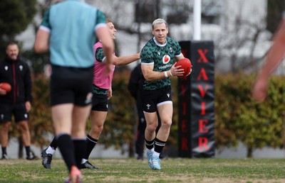 080724 - Wales Rugby enjoy a quick game of Aussie Rules Football in Training in the week ahead of their second test against Australia in Melbourne - Gareth Davies during training