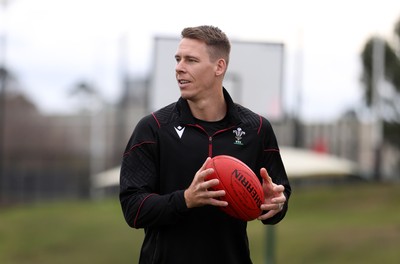 080724 - Wales Rugby enjoy a quick game of Aussie Rules Football in Training in the week ahead of their second test against Australia in Melbourne - Liam Williams during training