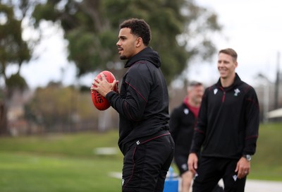 080724 - Wales Rugby enjoy a quick game of Aussie Rules Football in Training in the week ahead of their second test against Australia in Melbourne - Ben Thomas during training