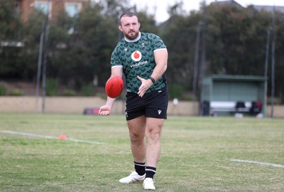 080724 - Wales Rugby enjoy a quick game of Aussie Rules Football in Training in the week ahead of their second test against Australia in Melbourne - Dillon Lewis during training