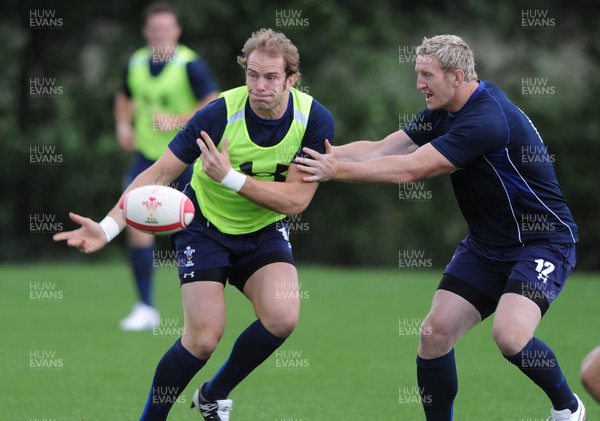 08.08.11 - Wales Rugby Training - Alun Wyn Jones is tackled by Bradley Davies during training. 
