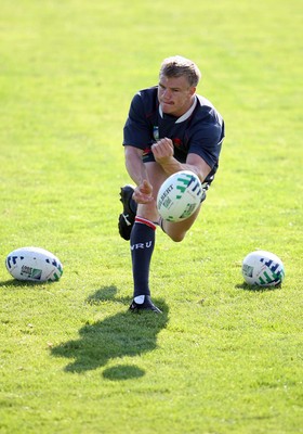 08.09.07 Wales World Cup training... Captain Dwayne Peel passes over his shadow. 
