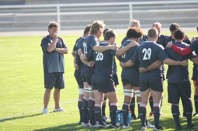 08.09.07 Wales World Cup training... Coach Gareth Jenkins watches over the players.. 