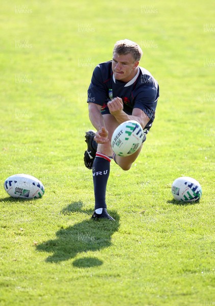 08.09.07 Wales World Cup training... Captain Dwayne Peel passes over his shadow. 