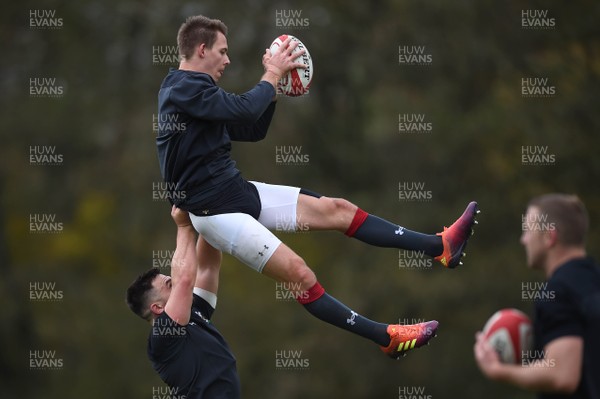 081118 - Wales Rugby Training - Liam Williams is lifted by Ellis Jenkins during training
