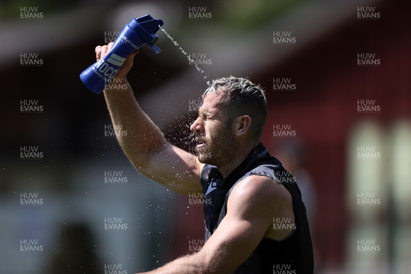 090723 - Wales Rugby World Cup Training camp in Fiesch, Switzerland - Gareth Davies cools off during training