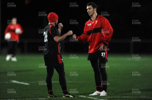 09.09.11 - Wales Rugby Training - George North talks to Shane Williams(L) during training. 