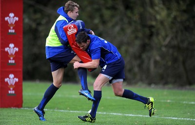 09.11.10 - Wales Rugby Training - Tom Prydie is tackled by Lee Byrne during training. 