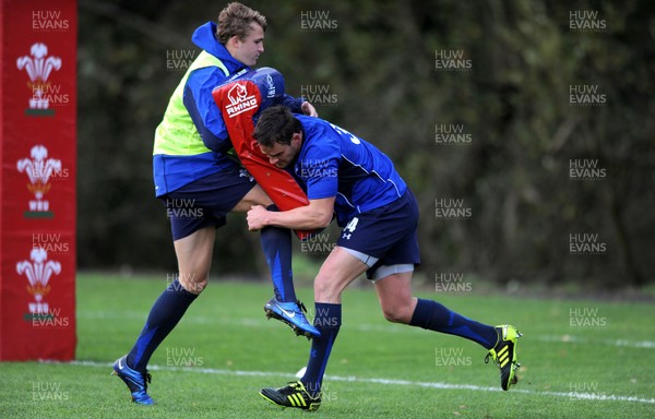 09.11.10 - Wales Rugby Training - Tom Prydie is tackled by Lee Byrne during training. 