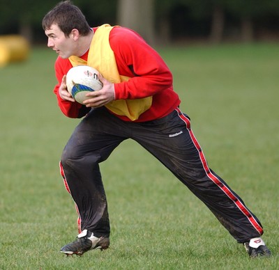 100203 - Wales Rugby Training - Iestyn Harris receives the ball