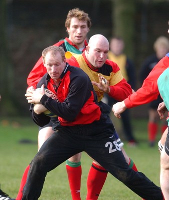 100203 - Wales Rugby Training - Gareth Thomas is tackled by Ben Evans