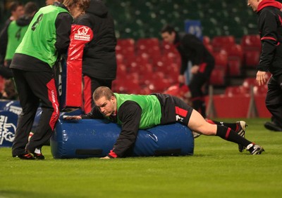 100212 Wales Squad Training - RBS 6 Nations Championship- Wales' Gethin Jenkins takes on a tackle bag