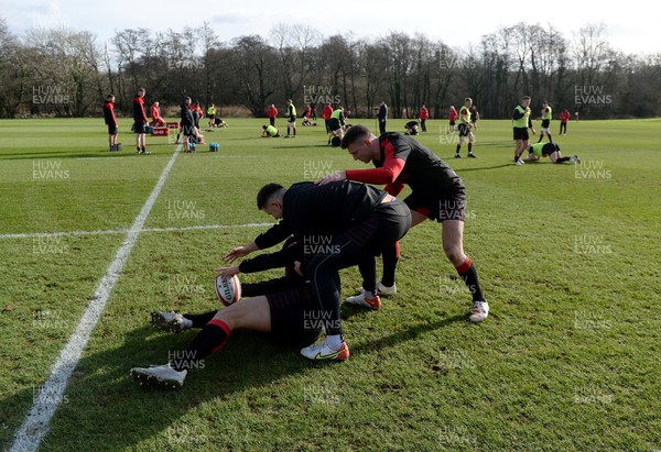 100222 - Wales Rugby Training - Louis Rees-Zammit, Owen Watkin and Dan Biggar during training
