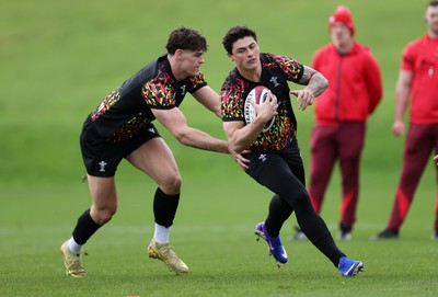 100326 - Wales Rugby Training ahead of their final Six Nations game against Italy - Eddie James and Louis Rees-Zammit during training