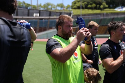 100725 - Wales Rugby Training in the final week of their tour to Japan - Garyn Phillips takes on water