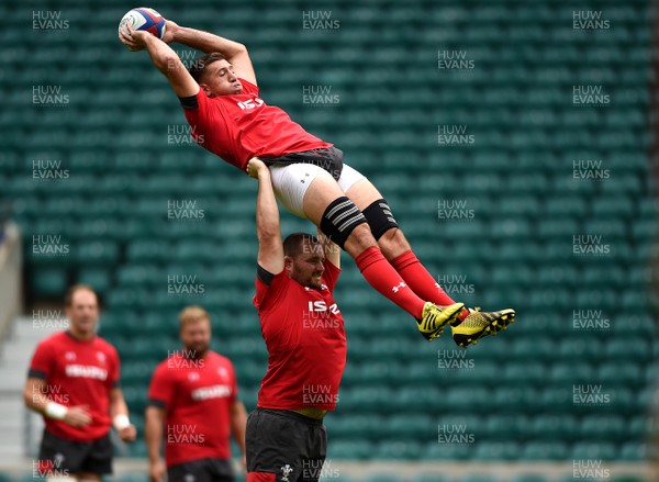 100819 - Wales Rugby Training - Justin Tipuric is lifted by Ken Owens during training