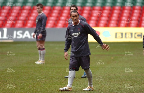 10.11.06 - Wales Rugby Training - Sonny Parker organizes the back line as Ceri Sweeney(L) and James Hook look on during training 