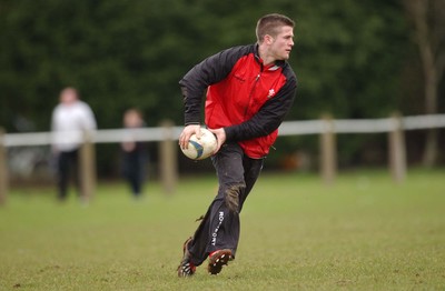 110203 - Wales Rugby Training - Ceri Sweeney gets the backs moving during training