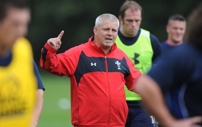 11.08.11 - Wales Rugby Training - Head coach Warren Gatland talks to players during training. 