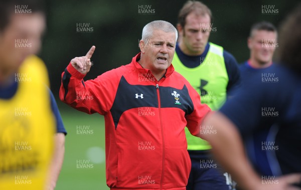 11.08.11 - Wales Rugby Training - Head coach Warren Gatland talks to players during training. 