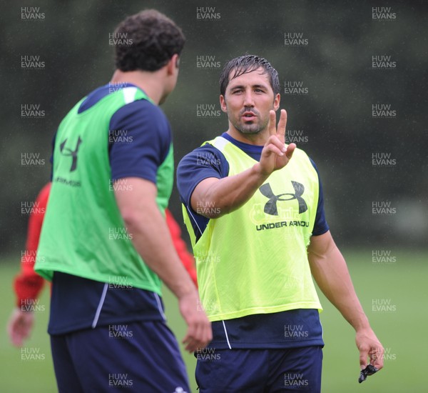 11.08.11 - Wales Rugby Training - Gavin Henson talks to Jamie Roberts during training. 
