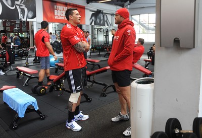 11.10.11 - Wales Rugby Training - Jamie Roberts talks to Sonny Bill Williams(L) during a gym session. 