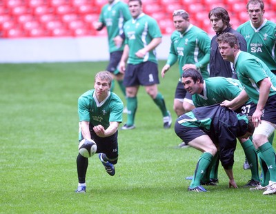 12.03.09 Wales rugby training... Warren Fury releases the ball during the last training session before the team left for Italy. 