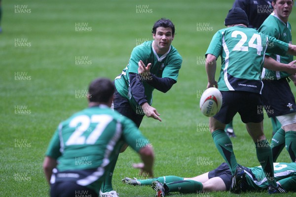 12.03.09 Wales rugby training... Mike Phillips releases the ball during the last training session before the team left for Italy. 
