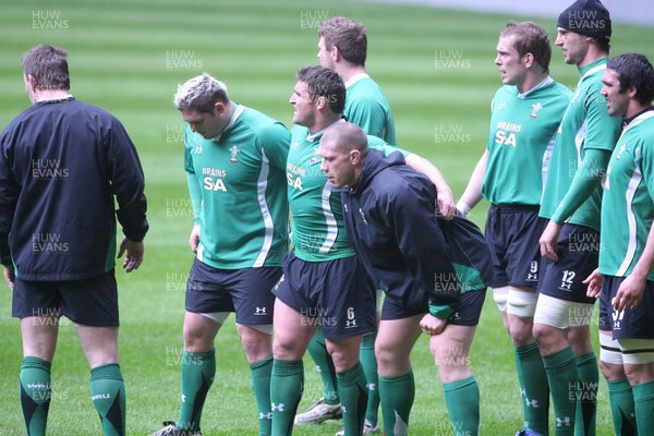 12.03.09 Wales rugby training... The front row of l-r Rhys Thomas, Huw Bennett and John Yapp during the last training session before the team left for Italy. 