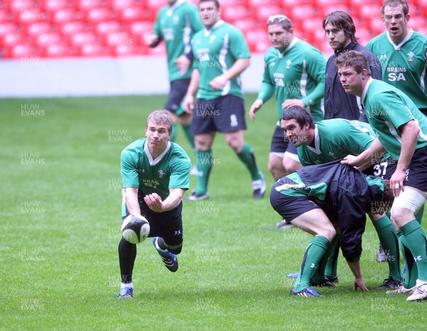 12.03.09 Wales rugby training... Warren Fury releases the ball during the last training session before the team left for Italy. 