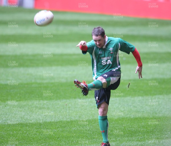 12.03.09 Wales rugby training... Shane Williams kicks the ball during the last training session before the team left for Italy. 