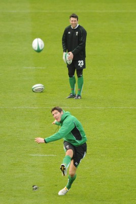 12.03.10 - Wales Rugby Training - Stephen Jones(top) and James Hook during kicking practice. 