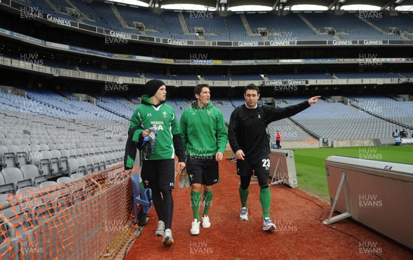12.03.10 - Wales Rugby Training - (L-R)Tom Prydie, James Hook and Stephen Jones leave kicking practice at Croke Park. 