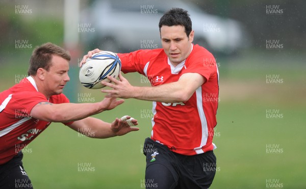 12.06.10 - Wales Rugby Training - Stephen Jones gets away from Matthew Rees during training. 