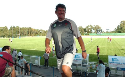12.09.07 - Wales Rugby World Cup Training - Wales Coach, Gareth Jenkins leaves training all smiles 