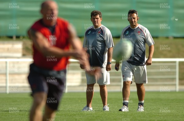 12.09.07 - Wales Rugby World Cup Training - Wales Coach, Gareth Jenkins looks on during training with attack coach, Nigel Davies 